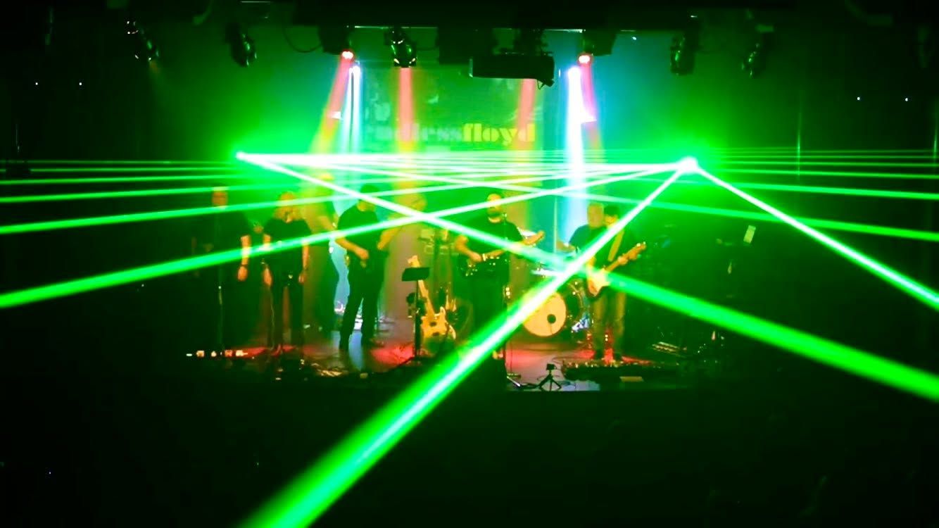 The stage bathed in green lasers