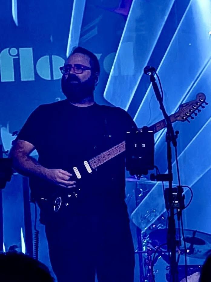 A guitarist on stage (vertical photo)